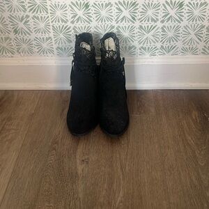 Black booties with lace and tie plus heels